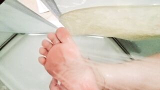 Washing my smutty soles (it tickles)