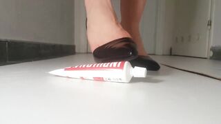 squeezing the tube with high boots