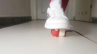 crushing little figurine