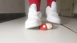 crushing little figurine
