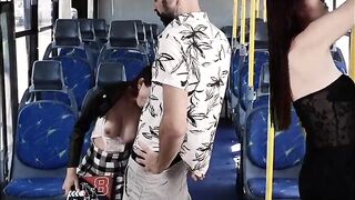 Stranger sneaks up behind female college students on the bus!