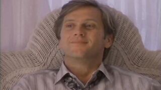 Jennifer Burton with Ashlie Rhey watching by her partner.