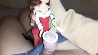 A doll puts a cock-sock on me and then gets banged 