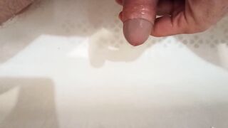 Pissing, spiting on the dickhead and wank in the baths.