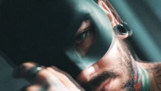 A mask underneath Bry Elijah's name -- 4K movie