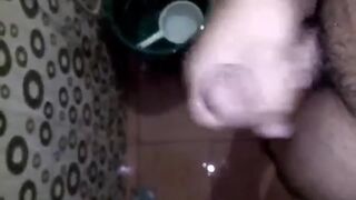 Lascivious Youthful Man Having Joy Jerking Off His Giant Rod in the Crapper