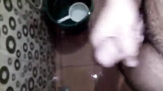Lascivious Youthful Man Having Joy Jerking Off His Giant Rod in the Crapper