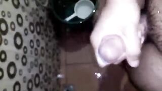 Lascivious Youthful Man Having Joy Jerking Off His Giant Rod in the Crapper