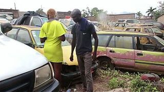 The mechanic has sex with his female customer in the garage whilst her vehicle is being repaired.