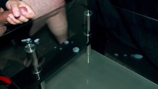Blowing out cum on my glass table!