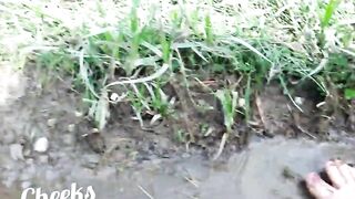 Exposed feet in mud