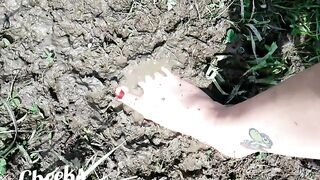 Exposed feet in mud
