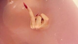 Naughty playgirl with large breasts talks indecent in the washroom