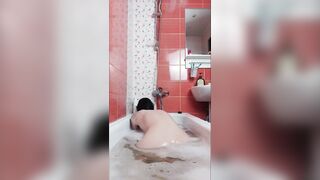natural aged woman takes a baths lazily scrub herself and gets joy. bath with GinnaGg
