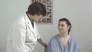 Old woman milks the saggy tit of a young woman