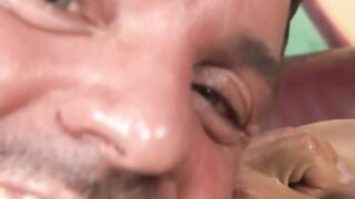Oiled bitch fisted up her ass and twat