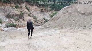 Grandma is walking around a gravel pit in constricted leggings and high heels!