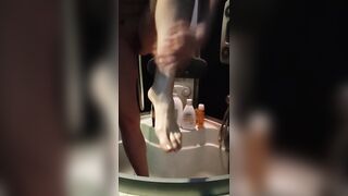 Anna Perv shaving legs in shower
