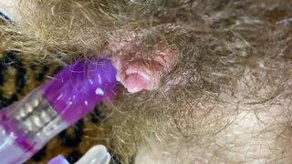 Bunny sextoy test masturbation POV closeup erected large clitoris soaked climax curly snatch