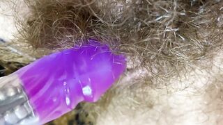 Bunny sextoy test masturbation POV closeup erected large clitoris soaked climax curly snatch