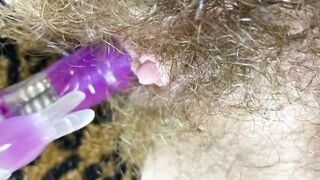 Bunny sextoy test masturbation POV closeup erected large clitoris soaked climax curly snatch