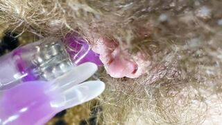 Bunny sextoy test masturbation POV closeup erected large clitoris soaked climax curly snatch