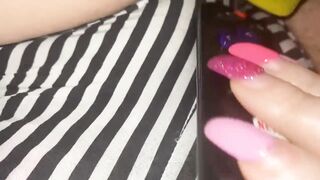 big beautiful woman masturbating with Remote over her shorts