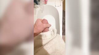 Slutty large shlong stud stroking in the baths, cumming in bathwater over feet, masturbating uncut large shlong