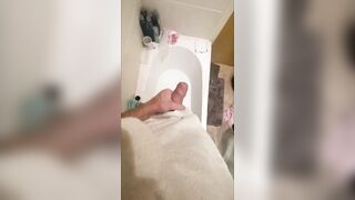 Slutty large shlong stud stroking in the baths, cumming in bathwater over feet, masturbating uncut large shlong