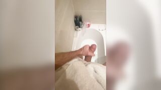 Slutty large shlong stud stroking in the baths, cumming in bathwater over feet, masturbating uncut large shlong