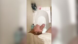 Slutty large shlong stud stroking in the baths, cumming in bathwater over feet, masturbating uncut large shlong