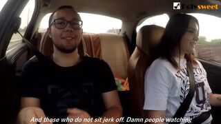 Cutie jerks off a man and masturbates herself during the time that driving