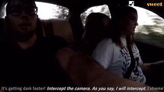Cutie jerks off a man and masturbates herself during the time that driving