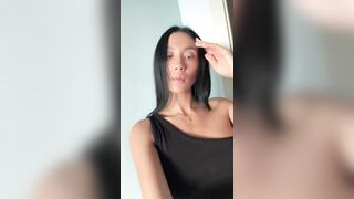 Curvy angel teases with hand on her chest ?