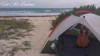 Playgirl passionately fondles herself on the beach in a tent