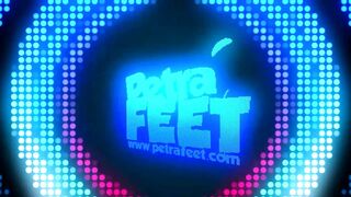 Petra plays with balloons and her feet