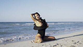 Hot Monika Fox In Ebony Bodysuit On Beach