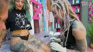 Tattoo Apprentice distracted from work by Customer SUCKING JOCK whilst getting tattooed
