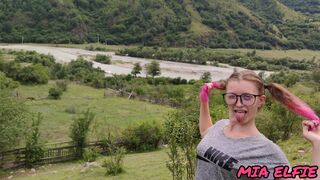 hotty with pink tips walks in nature in the mountains attracting attention to herself