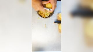 Peeling 'em Potatoe and greasing BACoN
