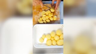Peeling 'em Potatoe and greasing BACoN