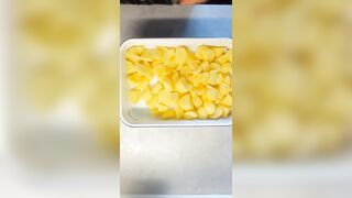Peeling 'em Potatoe and greasing BACoN