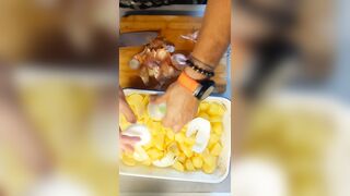 Peeling 'em Potatoe and greasing BACoN