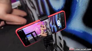 Myra Groans has set up her phone to stream her sucking off a bbc throughout a gloryhole for her fans.The small redhead gives a sloppy deepthroat for cum