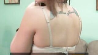 Fluffy babe disrobes in underclothes exposing her tattoo on her tummy