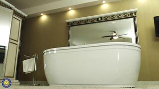 Hot Older Woman Carla S. Masturbates in Washroom