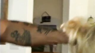 Surfer chap bangs a dazzling golden-haired with great melons in the living room