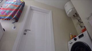 Fingering taut vagina in pink suit