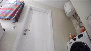 Fingering taut vagina in pink suit