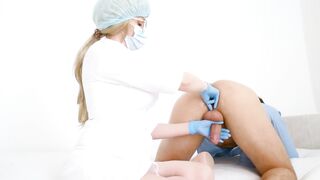Breasty Doctor milking the prostate. Stuck her finger up the booty